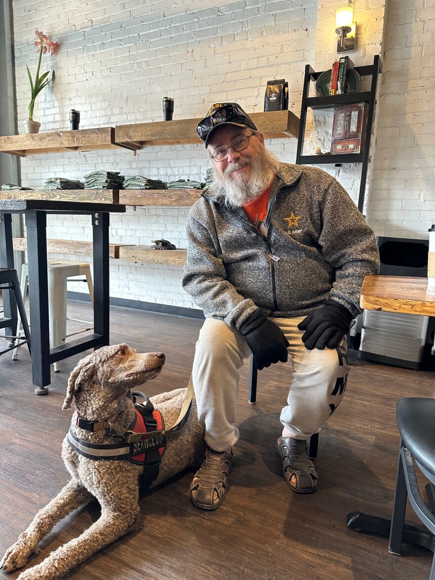 Robert Black, a Springfield resident, with his service dog, Chaco.
