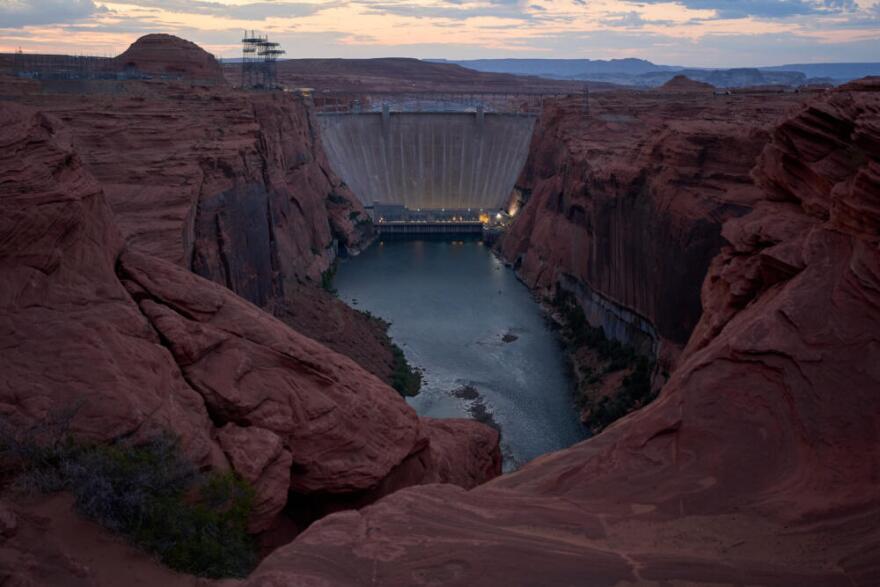 The Colorado River flows beneath the Glen Canyon Dam at the Glen Canyon National Recreation Area, Tuesday, July 14, 2026, near Page, Nev. (John Locher/AP)