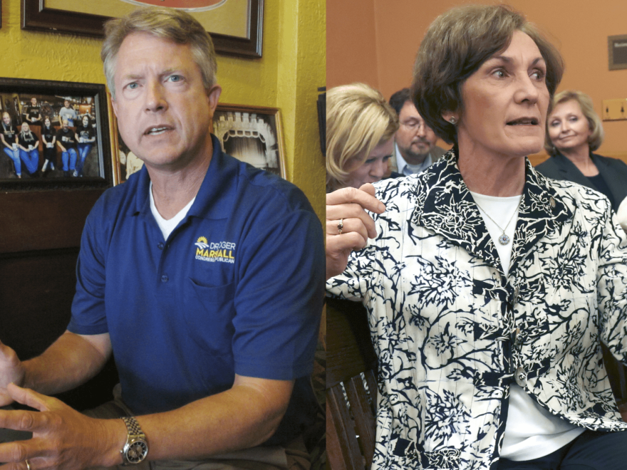Rep. Roger Marshall and Kansas state Sen. Barbara Bollier. (John Hanna/AP)