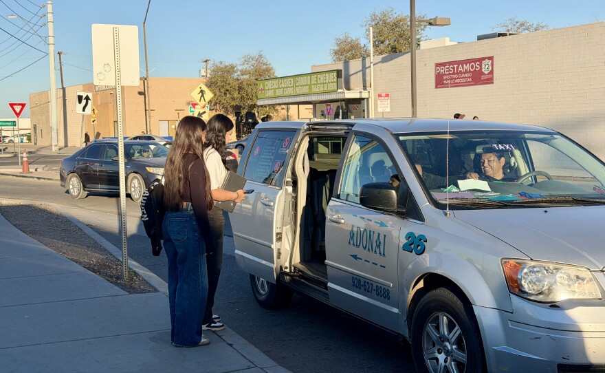 Two students enter a taxi at the San Luis Port of Entry on their way to school, joining dozens of other transborder students who rely on the service each morning. Photo taken on February 26, 2026.