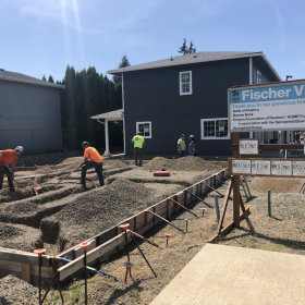 Workers in 2022 building the now completed Fischer Village low-income housing complex in Springfield