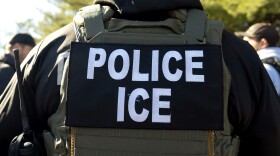 FILE: Immigration and Customs Enforcement officer listens during a briefing, Jan. 27, 2025, in Silver Spring, Md.