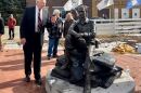 The Ernie Pyle statue in Dana, Ind., was dedicated on Veterans Day. Steve Key, president of the group that operates the Ernie Pyle World War II Museum in Dana, stands next to the statue.