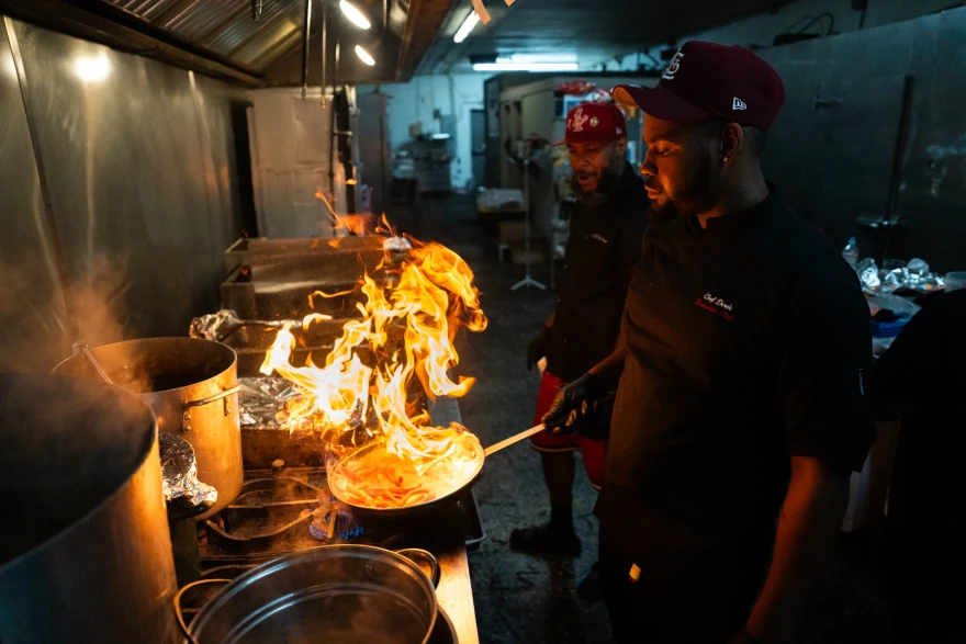 Stevie’s Jailhouse Kitchen executive chef Derek Huntley sautées peppers at the hole-in-the-wall eatery.