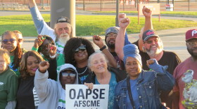 Drivers picket outside Princeton High School on Tuesday, Oct. 13