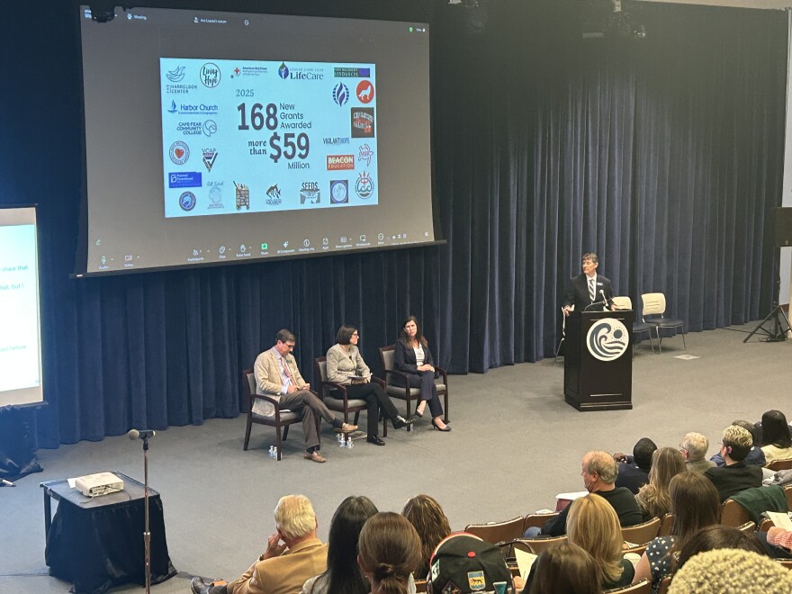 The Endowment’s leadership answers question at the public meeting at CFCC.