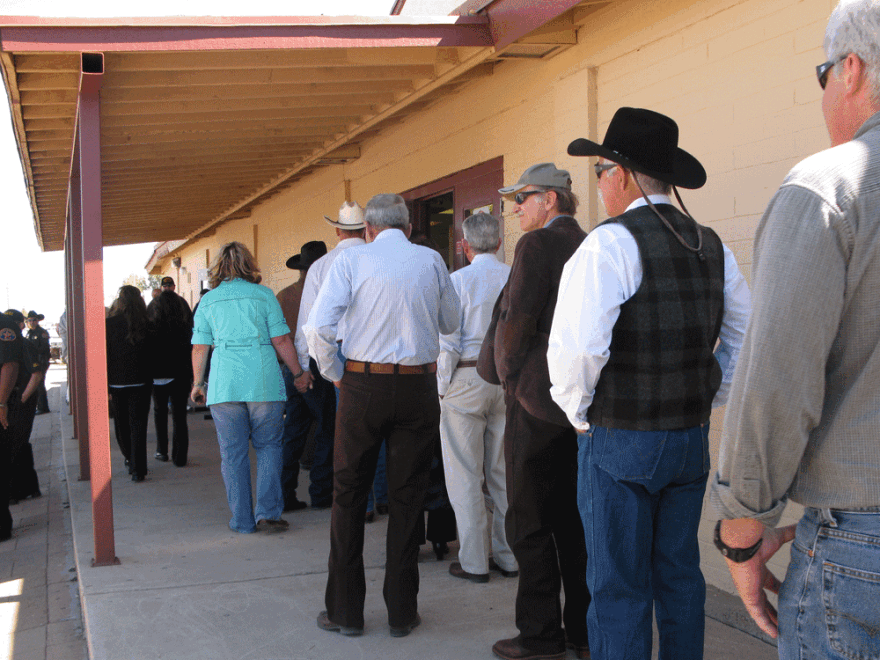 Family, friends and fellow ranchers lined up at the high school field house in Douglas, Ariz., to attend the funeral of Robert Krentz, who was found shot to death on his ranch along the Mexico border last month.