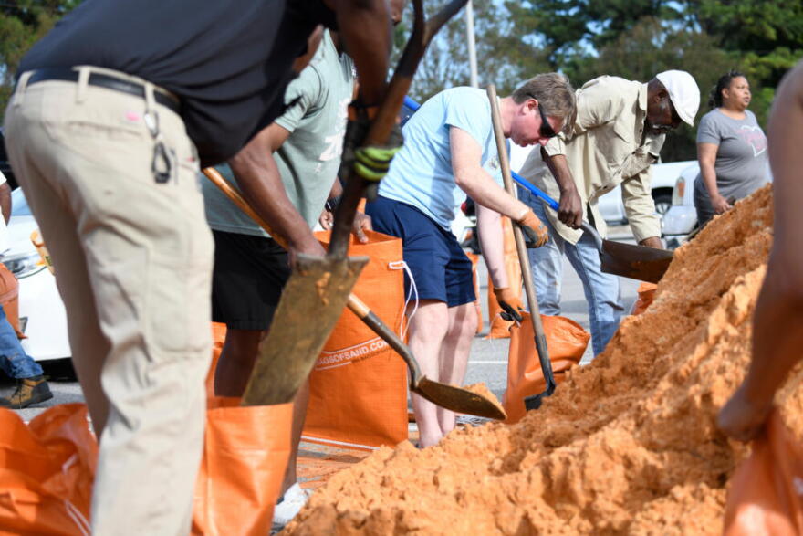 Residents pick up sandbags for storm preparation at the James Seals Jr. Parks & Recreation Center ahead of Hurricane Isaias' expected landfall along the Gulf Coast, Thursday, October 8, 2026, in Mobile, Alabama. (Octavio Jones/AP)