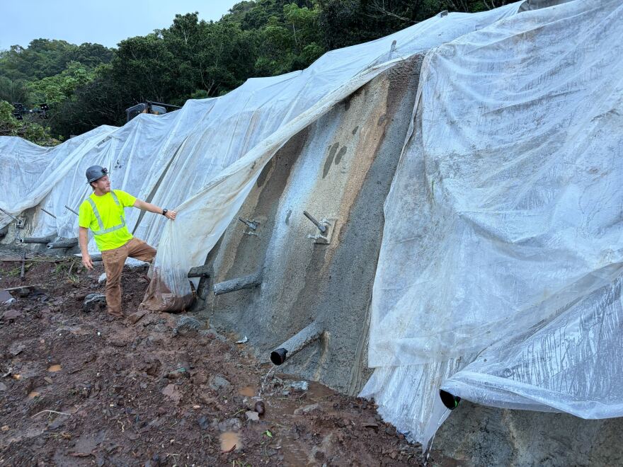 Repair work on the slope under the highway at Waimea Bay after the two Kona low storms in March 2026.
