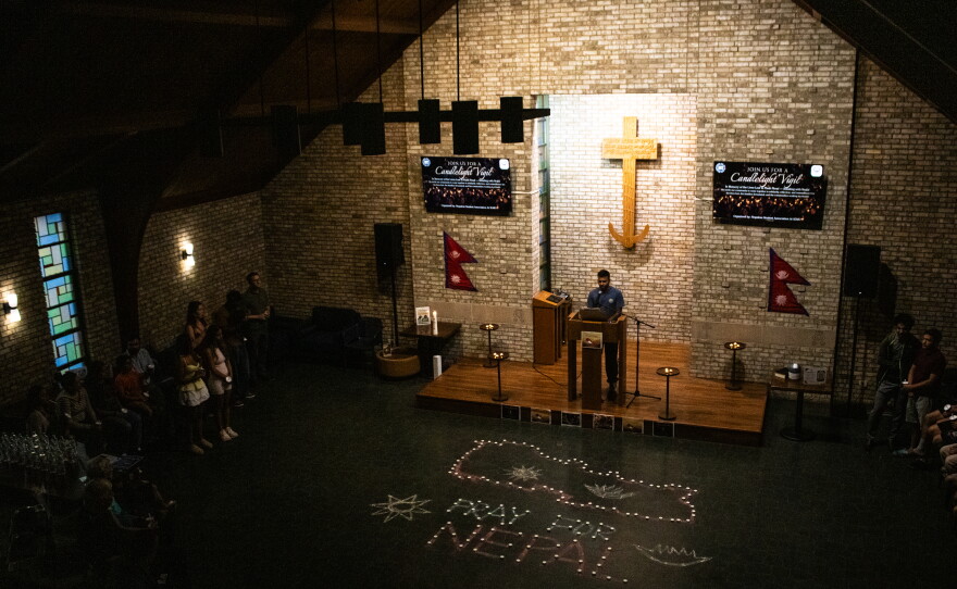 Achint Dahal addresses the crowd at the beginning of the candlelight vigil at Hope Lutheran Ministries in Cape Girardeau, Mo., Wednesday, Sept 9, 2026. This candlelight vigil was held to honor and respect those who may have lost their lives, homes, and family during the Nepal floods on Aug. 26.
