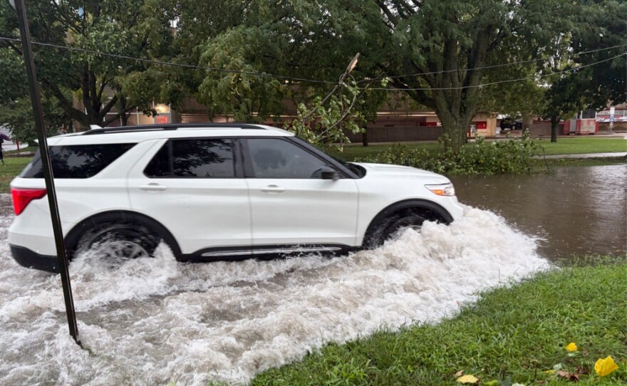 High winds and heavy rain led to downed trees, power outages and flooded streets across Bloomington-Normal.