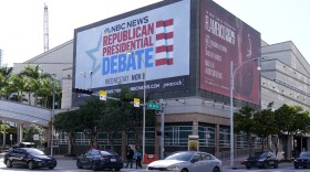 A billboard announcing the third Republican presidential debate in Miami is shown, Tuesday, Nov. 7, 2023, in downtown Miami. Five hopefuls will participate in the debate at the Adrienne Arsht Center for the Performing Arts of Miami-Dade County, according to the Republican National Committee. They are Florida Gov. Ron DeSantis, businessman Vivek Ramaswamy, former U.N. Ambassador Nikki Haley, Sen. Tim Scott, R-S.C., and former New Jersey Gov. Chris Christie. (AP Photo/Wilfredo Lee)