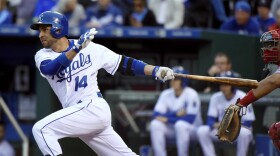 Kansas City Royals' Omar Infante hits an RBI single in the second inning during a game last month against the Cincinnati Reds.