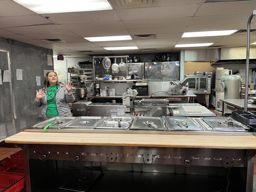 Lindsey Skripka, executive director of Meals on Wheels, instructs volunteers on how to package meals for seniors living in isolation ahead of Thanksgiving.