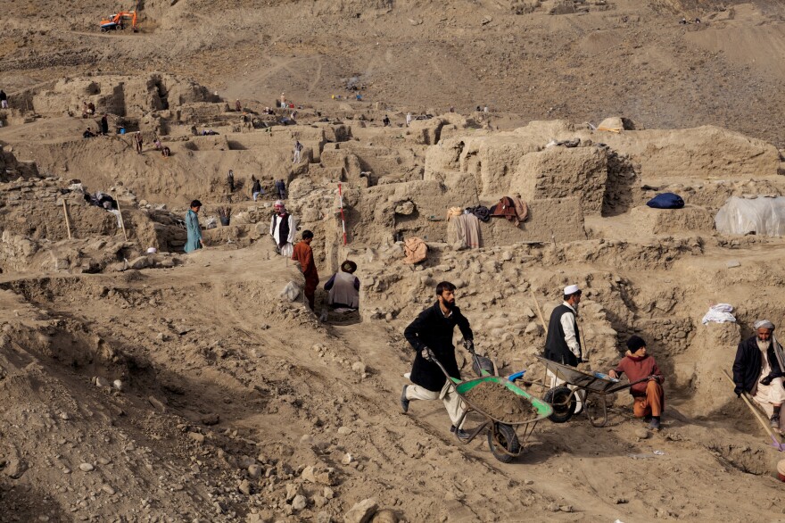 Villagers have been hired to help archaeologists with the excavation.