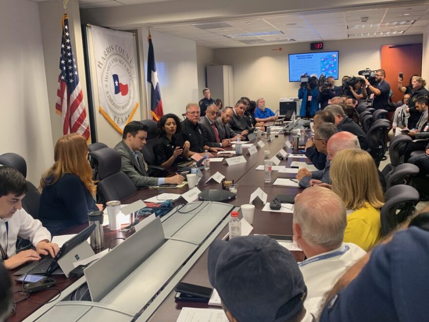 Harris County Judge Lina Hidalgo speaks with officials