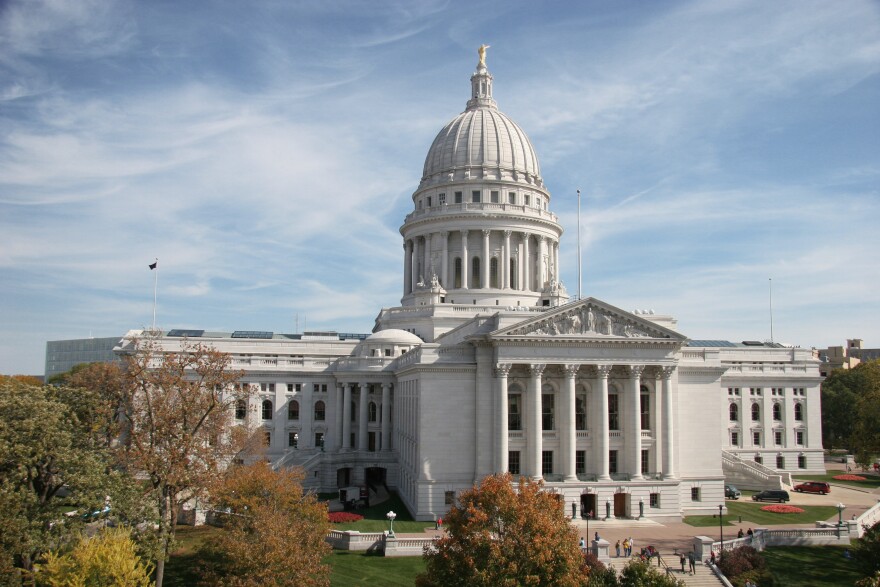 Shot of the Wisconsin Capitol building from the top of a firefighter ladder truck.