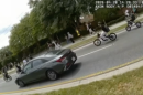 Students leave Windermere High School on e-bikes, weaving through traffic.