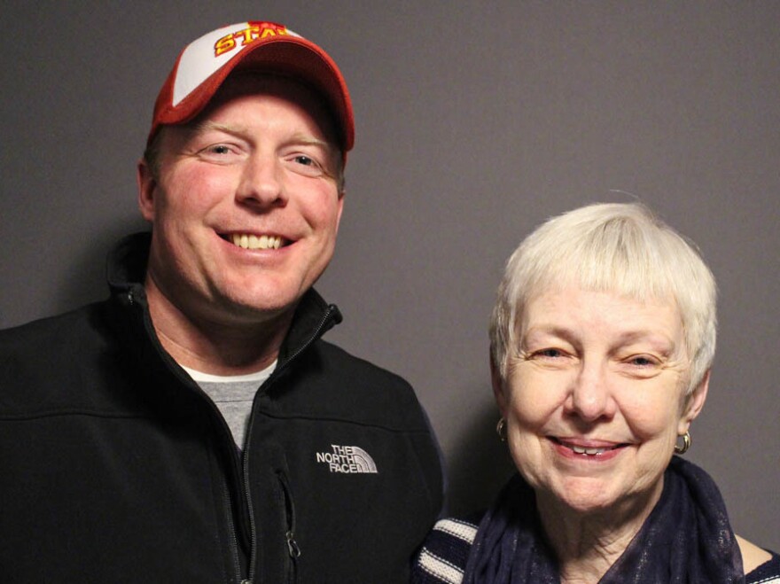 At StoryCorps in Des Moines, Iowa, in April, Ginnie Peters, 63, (at right) poses with Trent Andrews, 43, who took over farming her family's land in 2011 after her husband, Matt, took his own life.