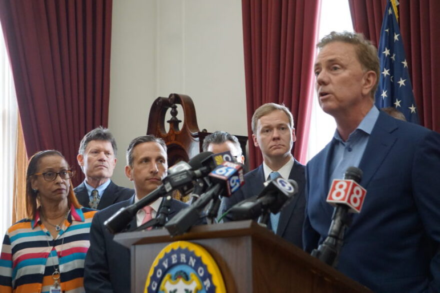 Gov. Ned Lamont (right) and Democratic legislative leaders announcing their budget deal in 2019, Lamont’s first year in office.