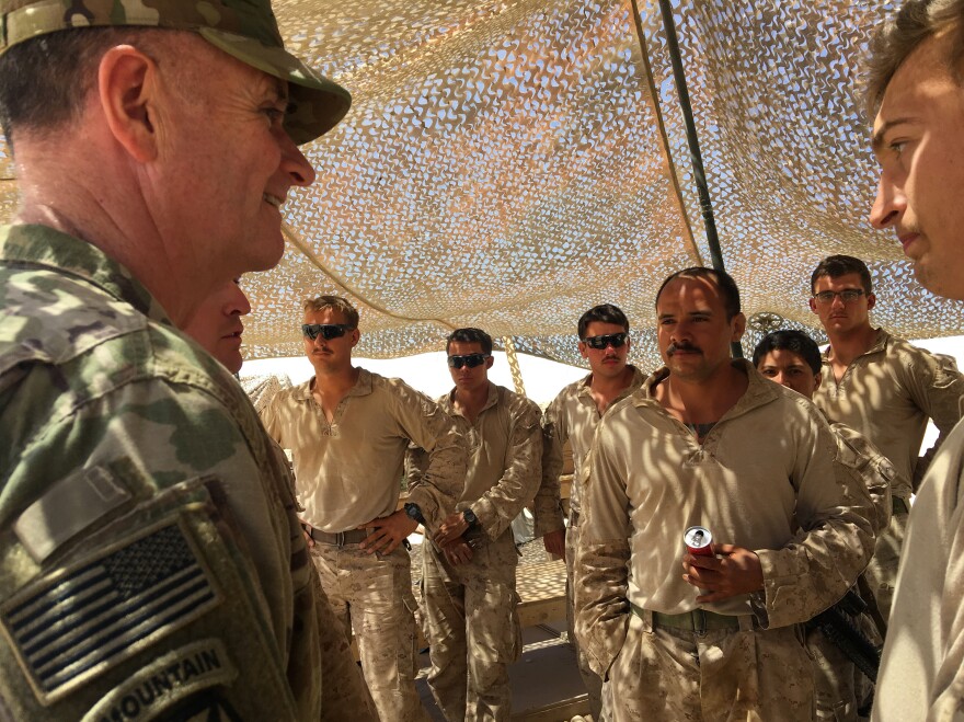 Maj. Gen. Walter Piatt, deputy commander of U.S. forces in Iraq, talks to Marines at the Um Jurius fire base, which supports Iraqi forces fighting ISIS. About 5,000 U.S. troops remain in Iraq.