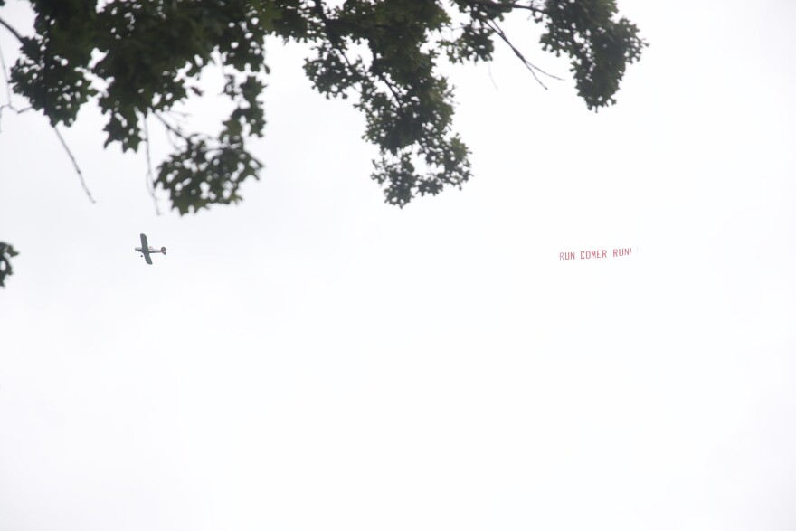 A plan bearing the message "RUN COMER RUN" circles the Fancy Farm picnic grounds.