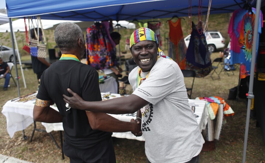 Festival attendees greet each other during the 2022 Publix Tampa Bay Collard Festival in St. Petersburg, Florida, on Saturday, February 19, 2022. Photo by Octavio Jones for WUSF