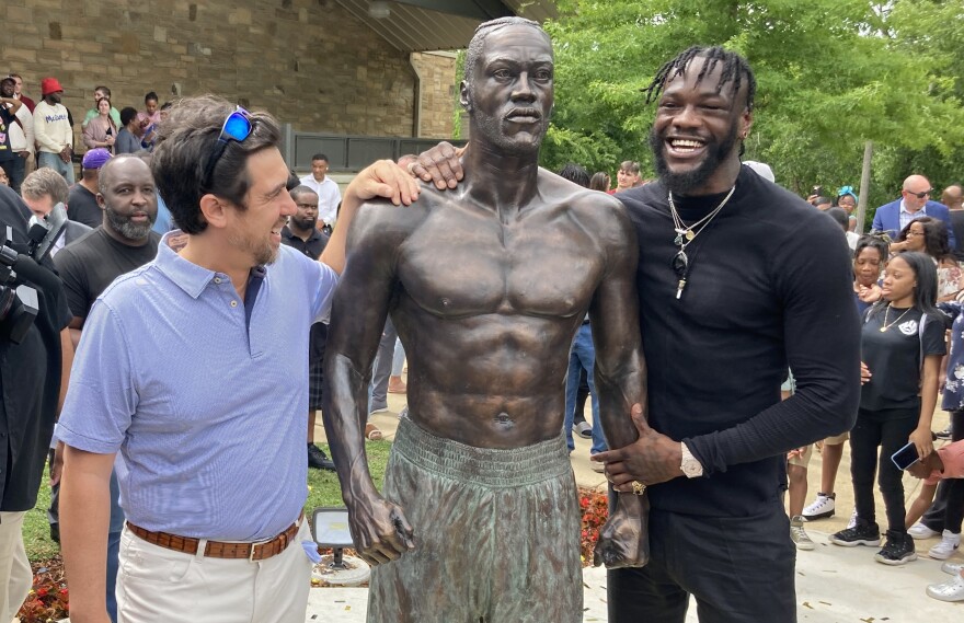 Deontay Caleb oConnor statue tighter.jpg