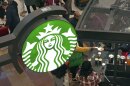 This is the Starbucks sign on Black Friday shoppers line at a Starbucks kiosk in the Walden Galleria in Buffalo, NY., Friday, Nov. 29, 2024. 