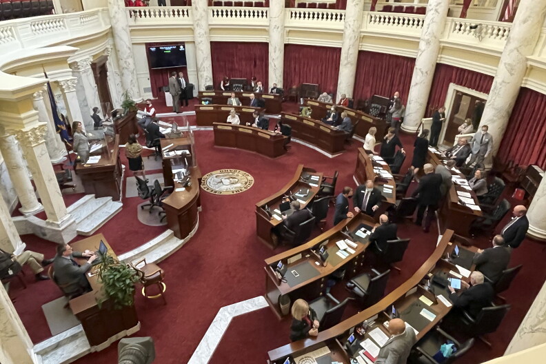The Idaho Senate gathers in the Statehouse in Boise, Idaho.