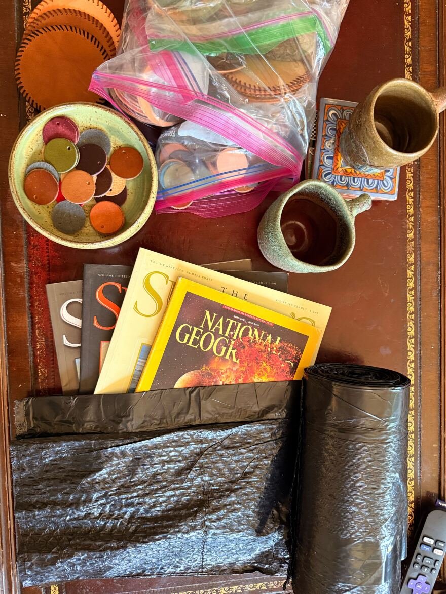 Leather and pottery work are among the several artworks Danielle Marriott saved during the floods.