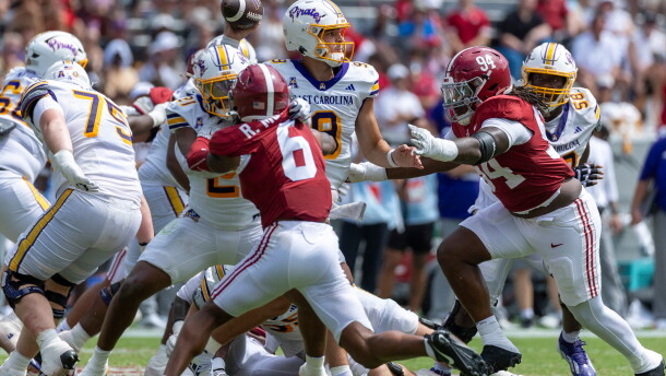 East Carolina quarterback Emory Williams (9) throws a pass as Alabama defensive lineman Edric Hill (94) pressures the play during the second half of an NCAA college football game Saturday, Sept. 5, 2026, in Tuscaloosa, Ala. (AP Photo/Vasha Hunt)