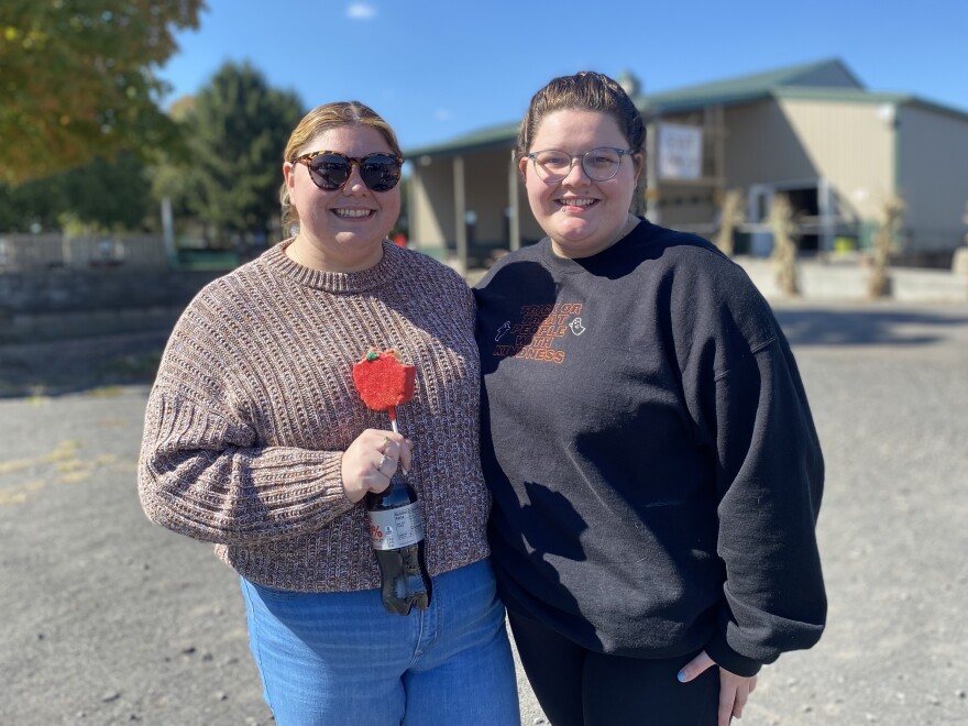 Erin Moore (left) and Shannon Thomas both say that while student debt cancellation is important to them, protecting abortion access is the principal reason they are voting in November.