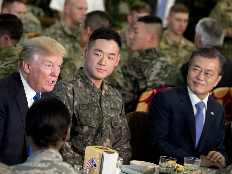 President Trump and South Korean President Moon Jae-in, right, have lunch with U.S. and South Korean troops at Camp Humphreys in Pyeongtaek, South Korea, on Tuesday.