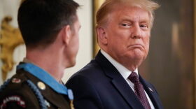 U.S. President Donald Trump looks on after presenting the Medal of Honor to Sergeant Major Thomas P. Payne, United States Army, for conspicuous gallantry in the East Room of the White House in Washington, DC.