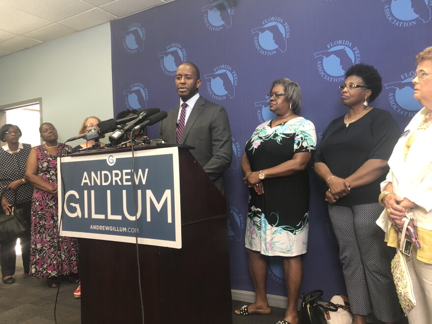 Gillum speaks at a press conference to propose his education plan.