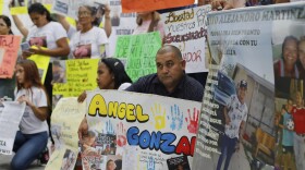 Relatives of Venezuelan migrants in the U.S. who were flown to a prison in El Salvador by the U.S. government, which alleged they were members of the Tren de Aragua gang, protest in April outside the United Nations building in Caracas, Venezuela.