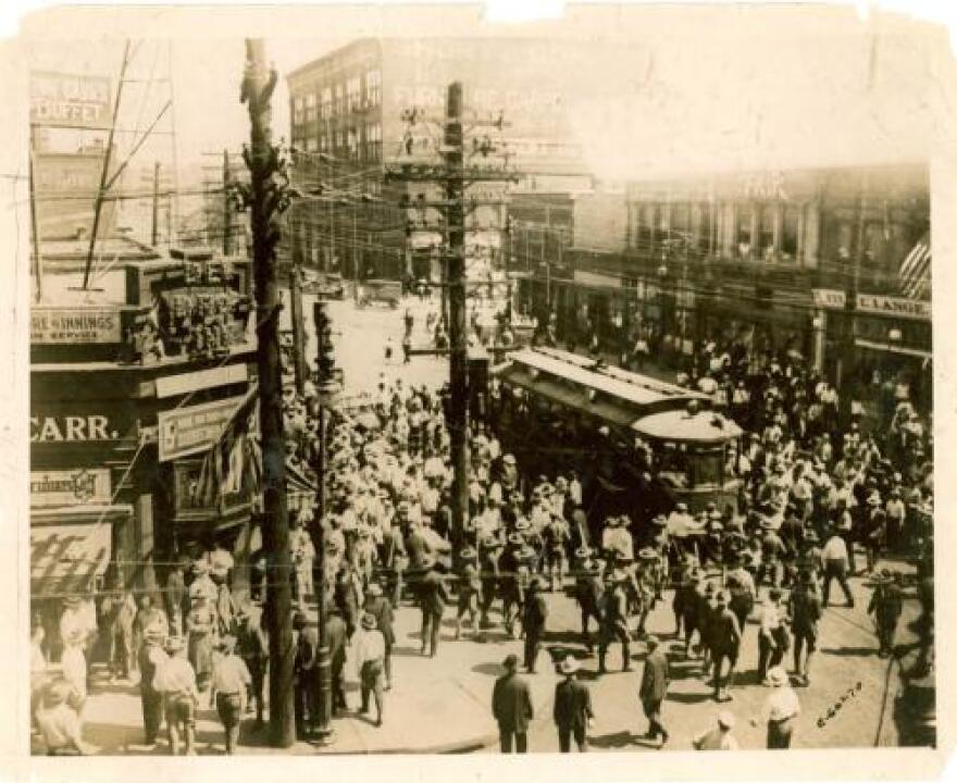 A mob stops a street car during the East St. Louis race riots, which started on July 2, 1917. 