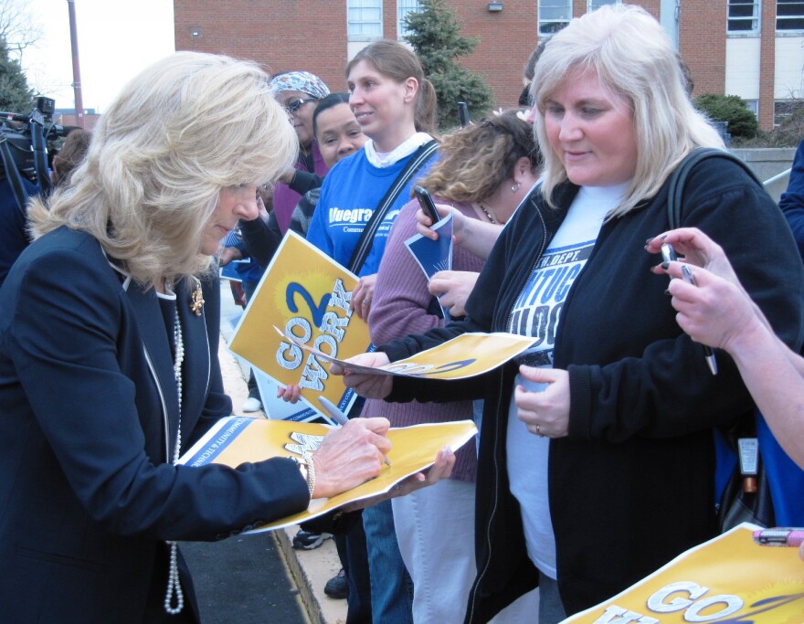 Dr. Jill Biden (left) signs autographs for students and teachers at Bluegrass Community & Technical College