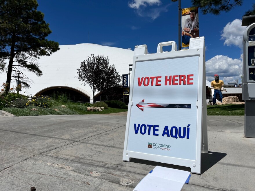 A sign directs voters to the polls on Northern Arizona University's Flagstaff campus during primary Election Day on Tue, Aug. 2, 2022.