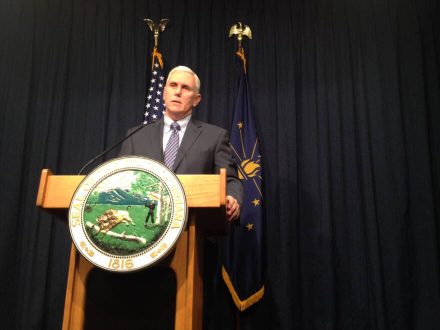Gov. Mike Pence pledges to reduce the 2015 ISTEP test with the help of State Superintendent Glenda Ritz on Wednesday, Feb. 11, 2015 at the Statehouse.