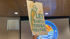 Sign held during BOCC meeting
