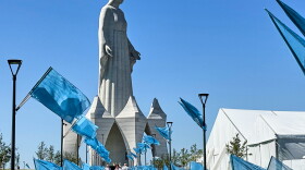 People walk inside an enormous statue of the Virgin Mary that is believed to be Europe's tallest during the inauguration in the village Konotopie, Poland, Saturday, Aug. 15, 2026.