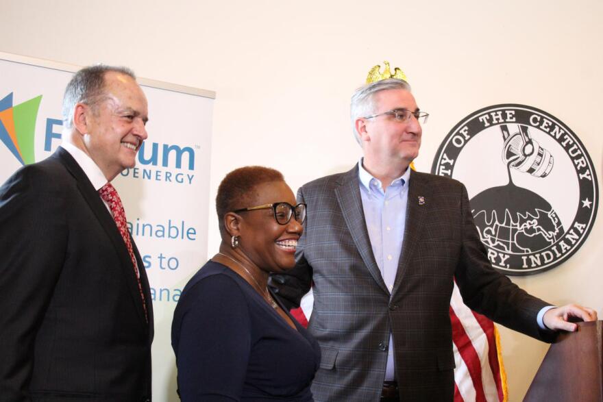 (Left to right) Fulcrum President and CEO Jim Macias, Gary Mayor Karen Freeman-Wilson, and Gov. Eric Holcomb celebrate Fulcrum's announcement. (Samantha Horton/IPB News)