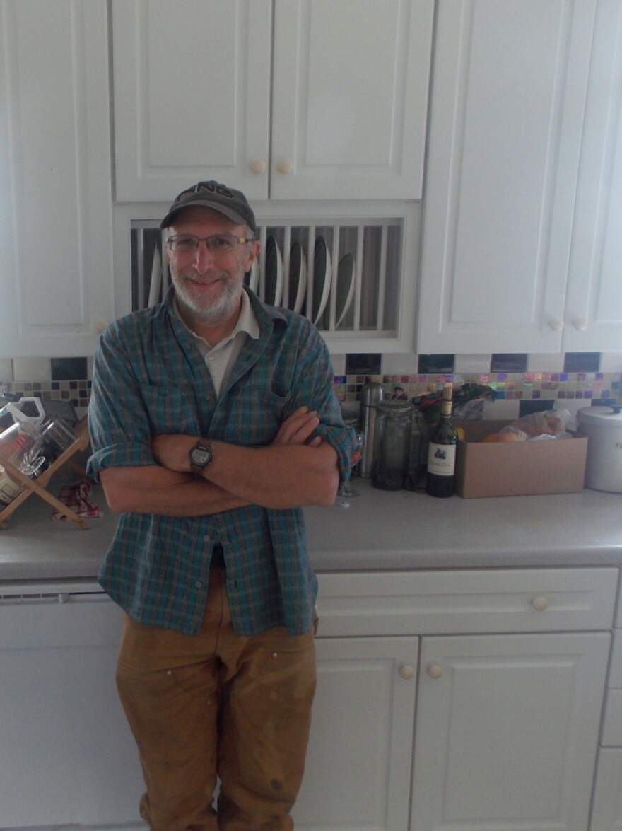 Paul Sharpe, the Lighthouse Keeper for the summer 2015 season, stands in his kitchen.(Joe Sykes)