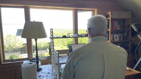 While sitting at his desk, the author can look out at the Southern Vermont hills. That's the setting of his novel, "The Gatepost."