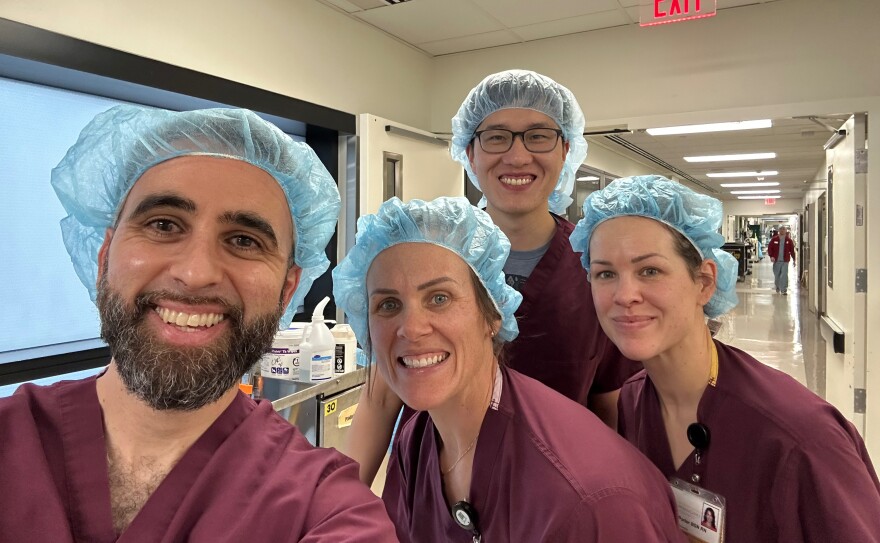 Dr. Ramy El-Diwany, left, and members of his transplant team at University of Iowa Health Care.