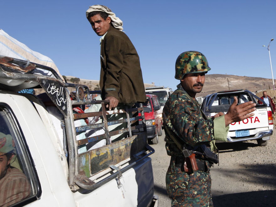 A Yemeni soldier operates at the checkpoint on the northern entrance of the capital, San'a, on Jan. 13.