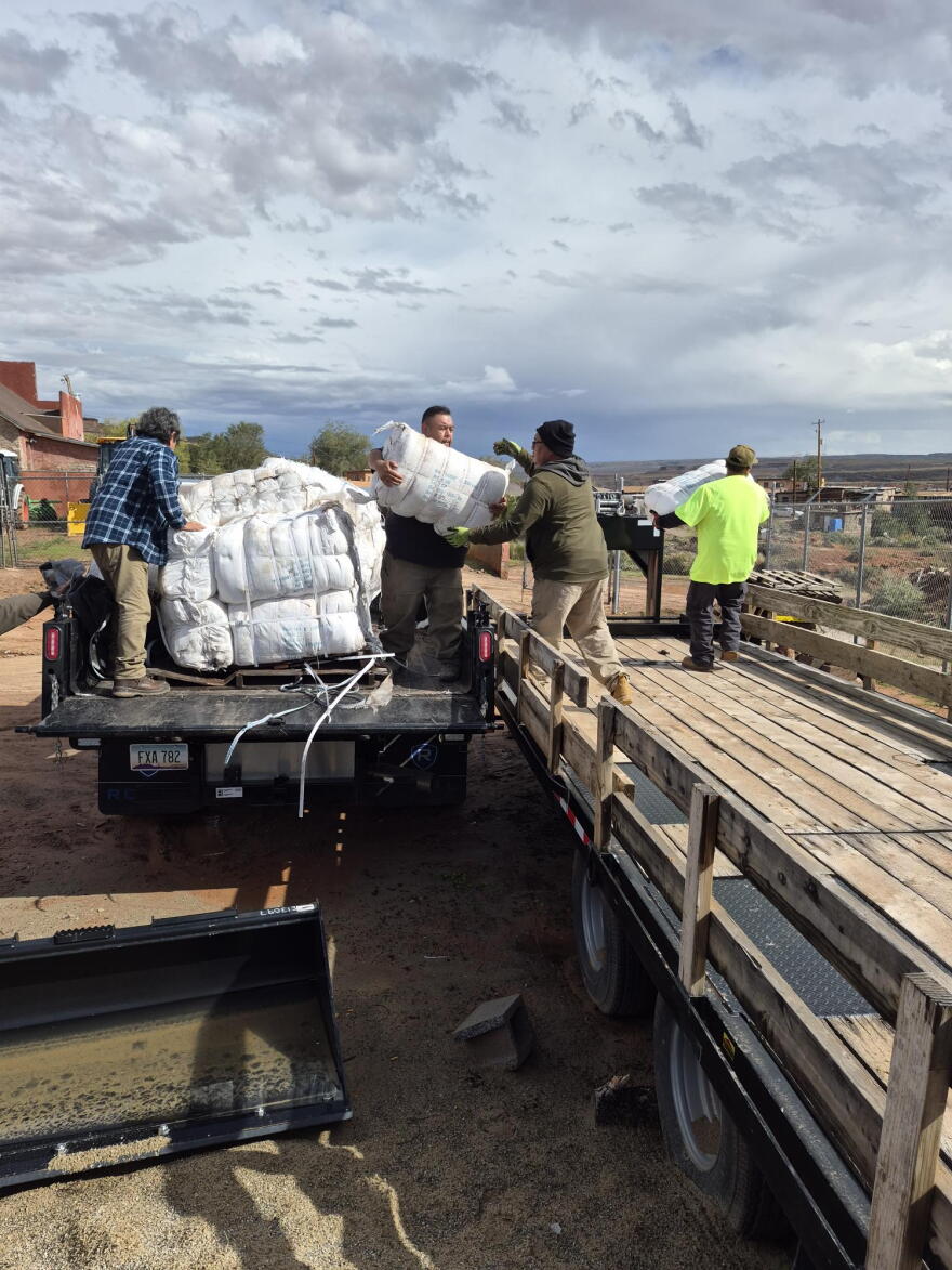 Crews offload sandbags to help with the overflowing Moenkopi Wash on the Hopi reservation during the week of Oct. 19, 2026 following several days of heavy rainfall that triggered flash flooding across the region.