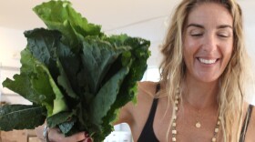 Melissa Lynch packs produce bags.